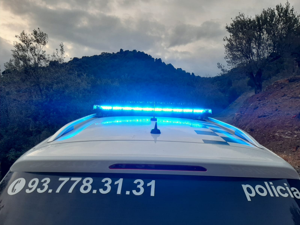 Imatge de les llums d'un cotxe de policia
